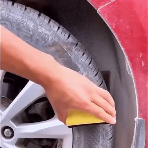 ClearVision Tire Shine bottle with product features on a dark background